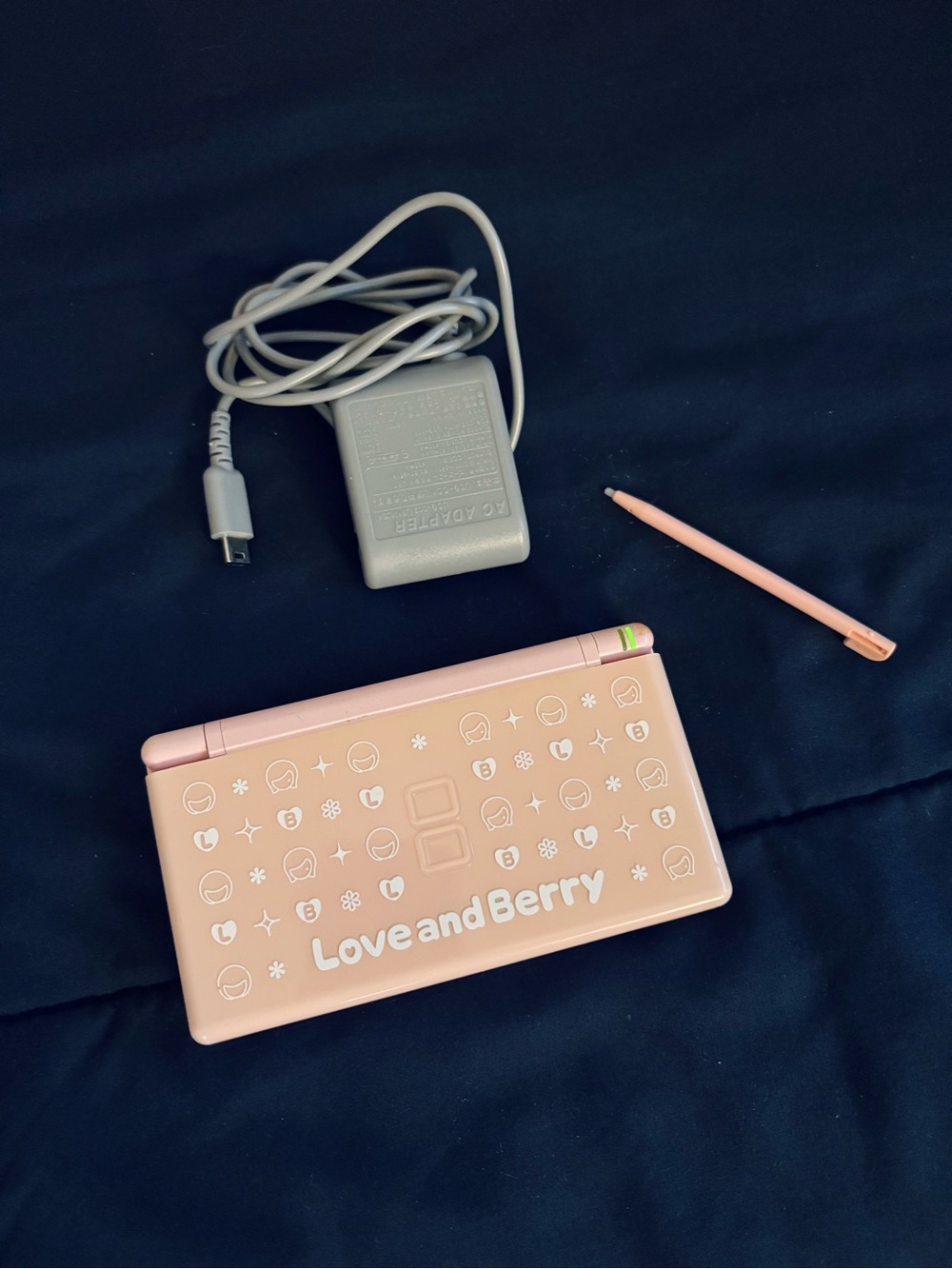 Nintendo DS Lite, special edition “Love and Berry” handheld console.